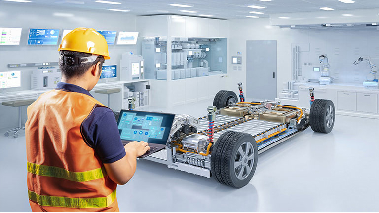 Technician performing hands-on EV battery repair training